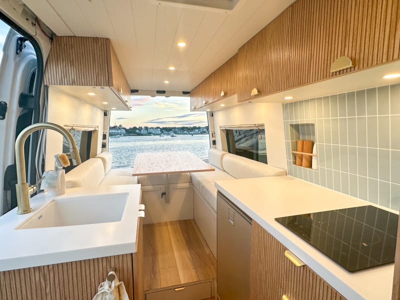 Taken from the cab of the van. Plenty of counterspace for your cooking needs and  very comfortable 5