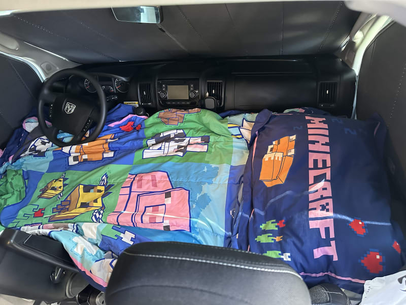 Using the Luno air mattress, the front seats are a great place for a child to sleep.