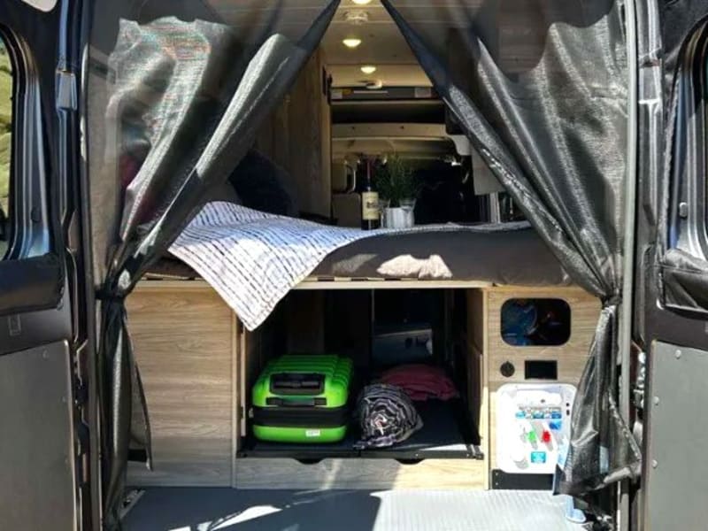 With the rear doors wide open, you'll have unrestricted access to the rear storage or a stunning backdrop for your campsite, making every moment memorable.