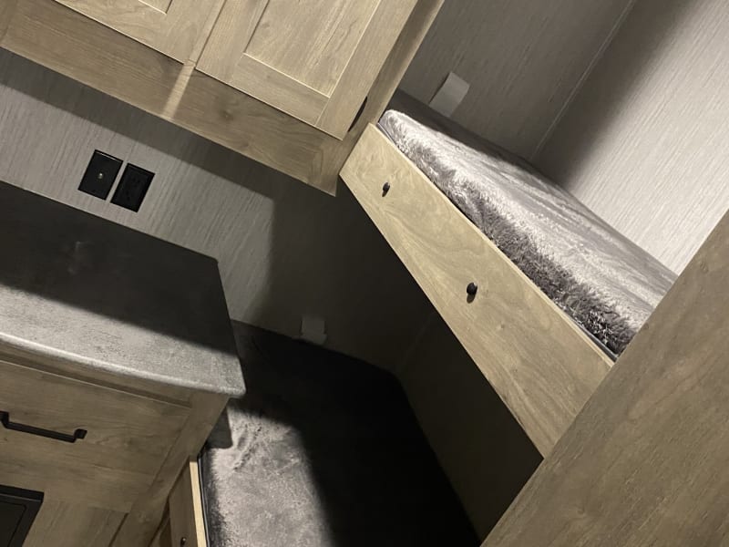 Bunk room. Has 3 beds 