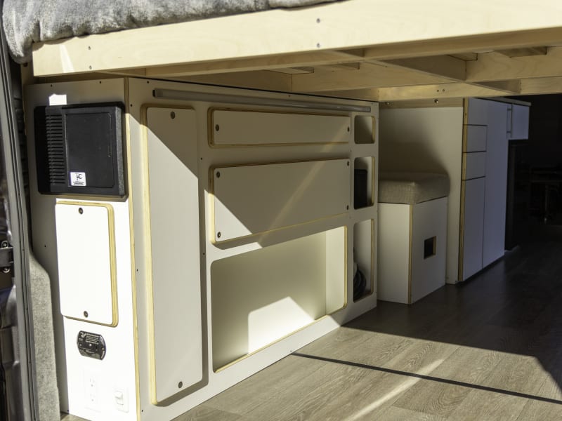 Storage cubbies keep things secure while driving