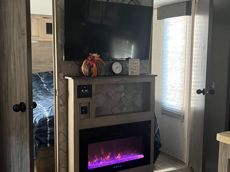 This fireplace can actually keep the entire camper warm but there is also central heat and air as well.