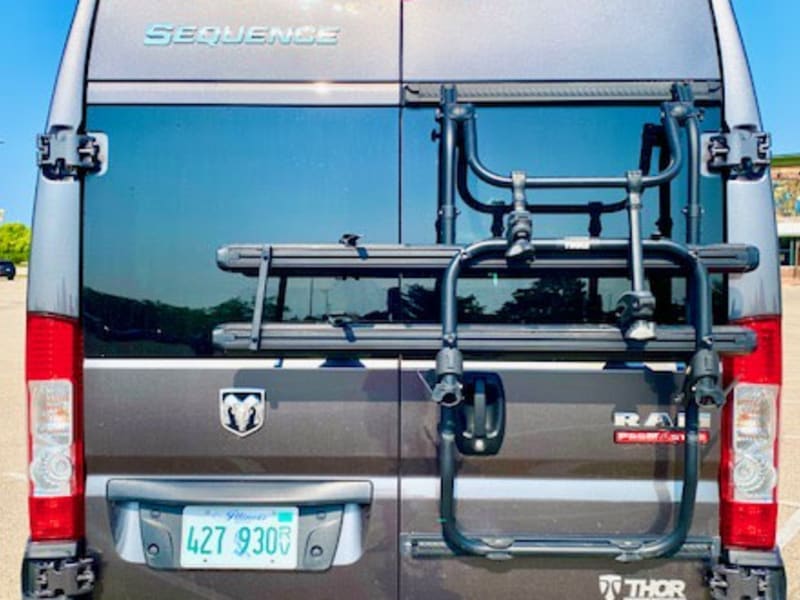 The Thule bike rack folds and stores neatly up against the van while not in use.