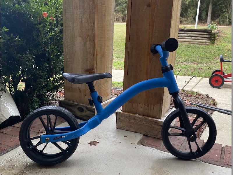 Balance bike for a boy available as an add-on for $5 per trip.