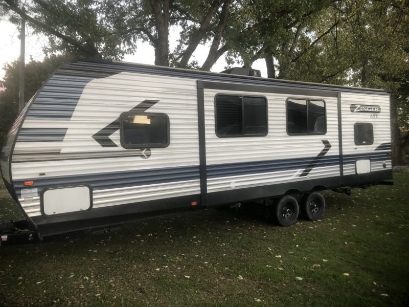 Side of camper with large slide-out (retracted in this picture).