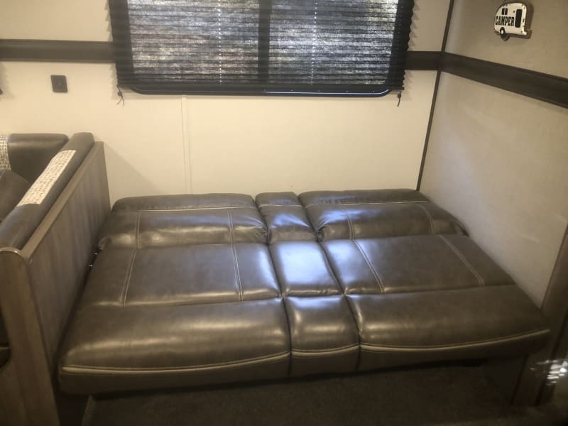 Jacknife couch that fold out to a bed.  All linens and pillows are provided.