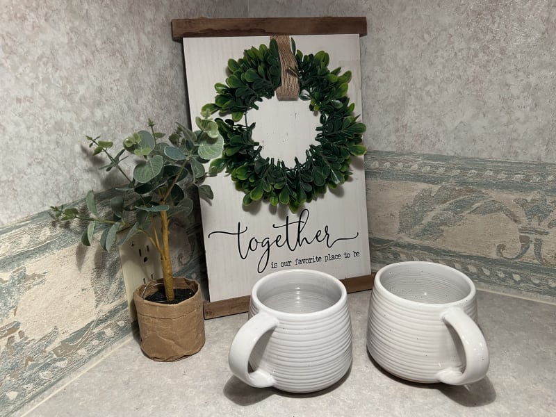 Coffee mugs and coffee maker included, a must for any cozy camp morning!  