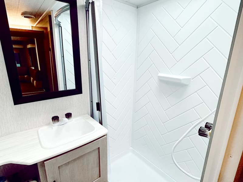 Large walk in shower with on demand hot water