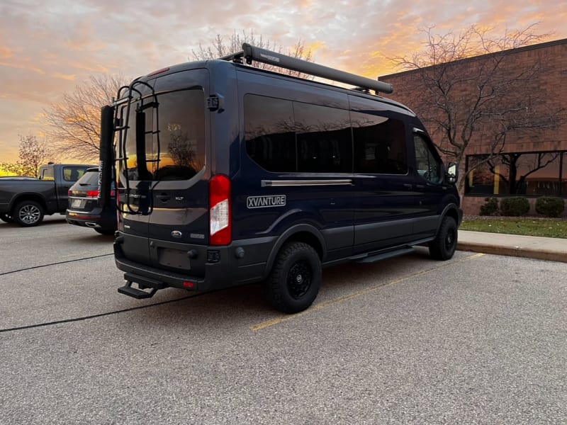 This van sits on after-market suspension, as well as BFG tires and Rhino rims