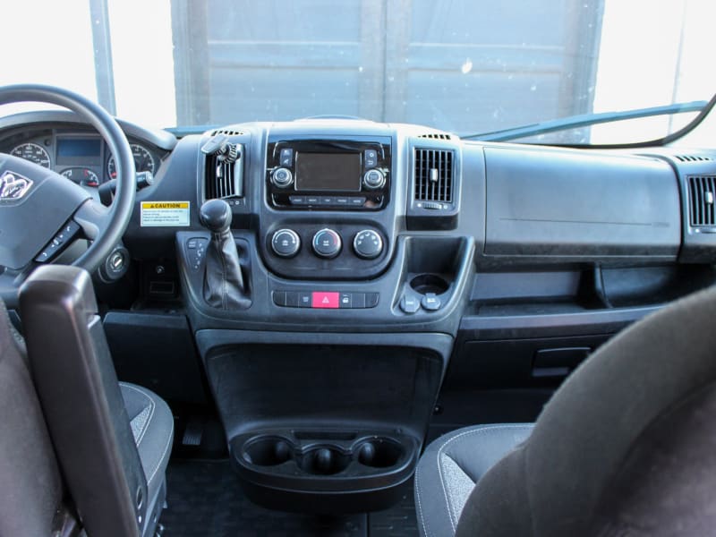Front driving area. It has bluetooth capabilities, we also have a magnetic phone mount to use for directions while driving. 