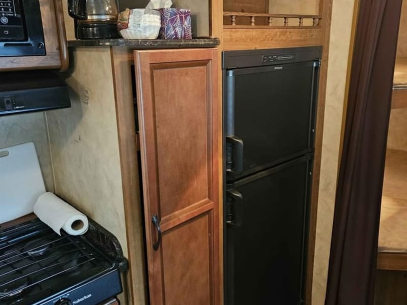 Large pantry, microwave, and fridge/freezer