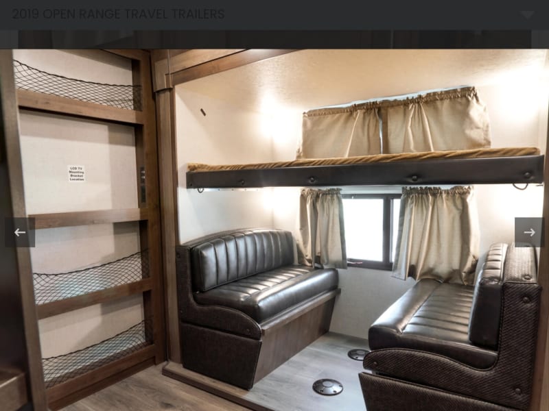 fold down bed and eating area in bunk room