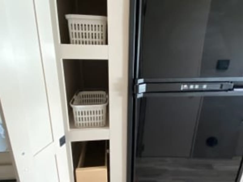 Pantry with a couple of pull out shelves