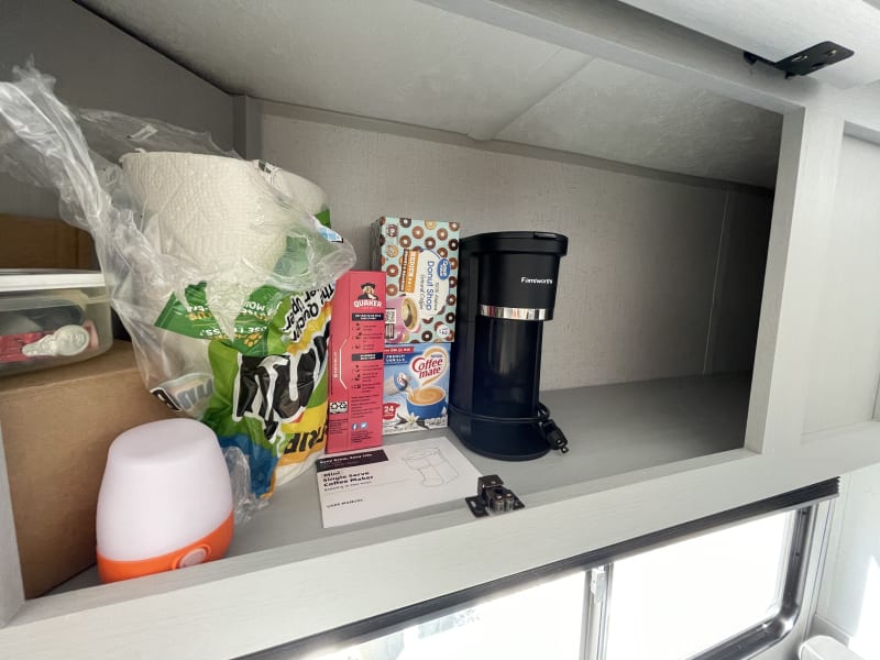 Storage above dinette with some of the items we offer