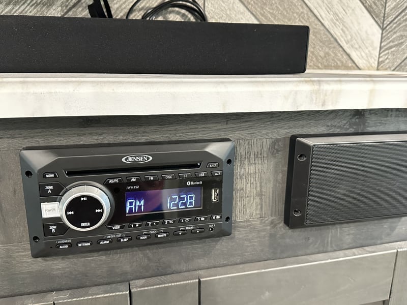 Radio that connects to indoor and outdoor speakers