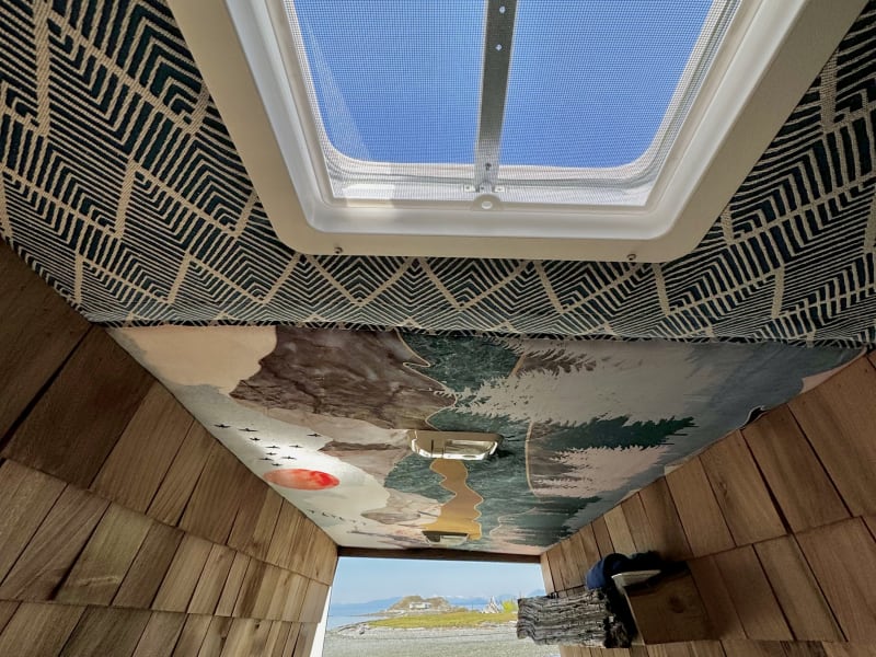 View of the ceiling and air vent.