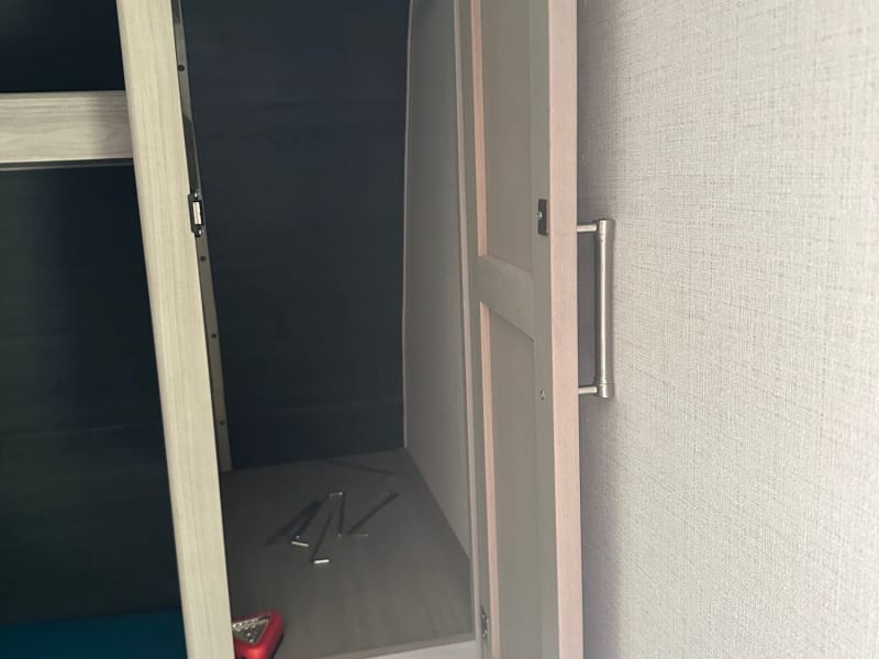 small closet area with a rod to hang clothes