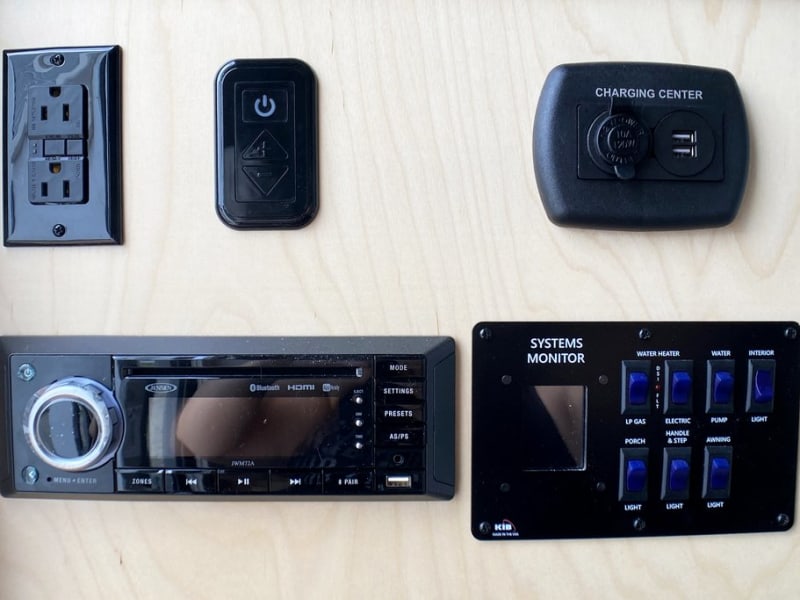 Multiple outlets and charging station, stereo system with Bluetooth, and system controls.