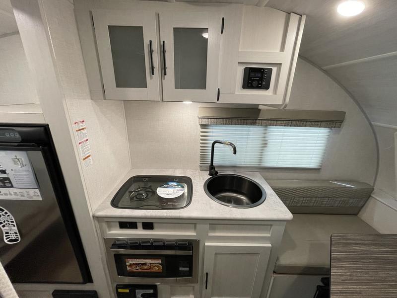 2 burner stove, microwave/convection oven combo, large deep sink