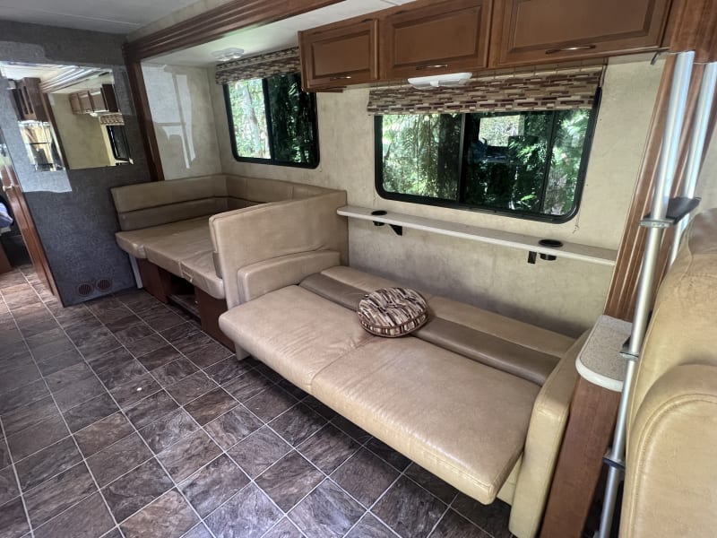 Couch and table flatten to make beds.