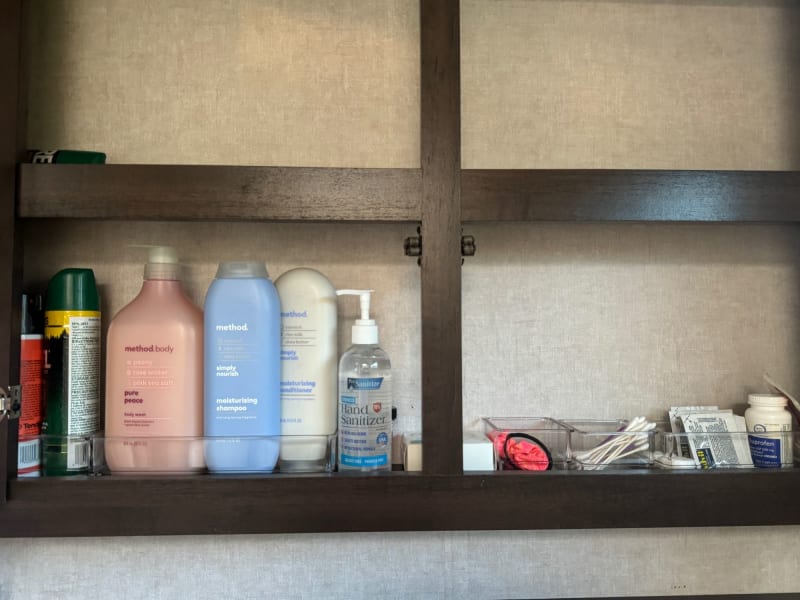 Fully stocked bathroom (qtips, advil, bug spray, body wash, shampoo, conditioner)