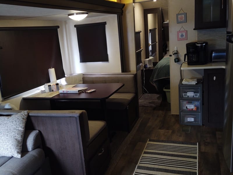 We recently removed the U-shaped dinette that had a small table to this true 4 seater restaurant style table. 