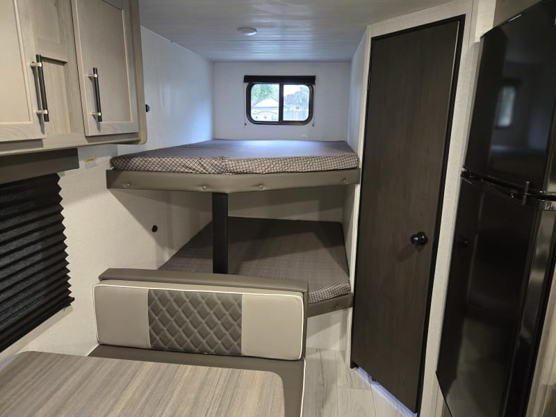 Double full bunks with bottom bunk underneath storage