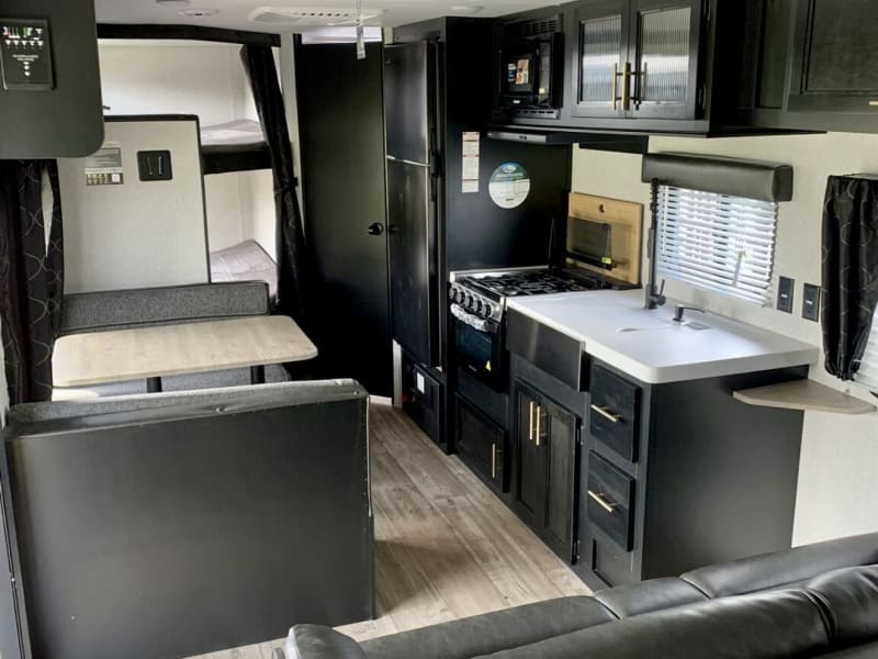 Kitchen, dinette, fridge, bathroom door