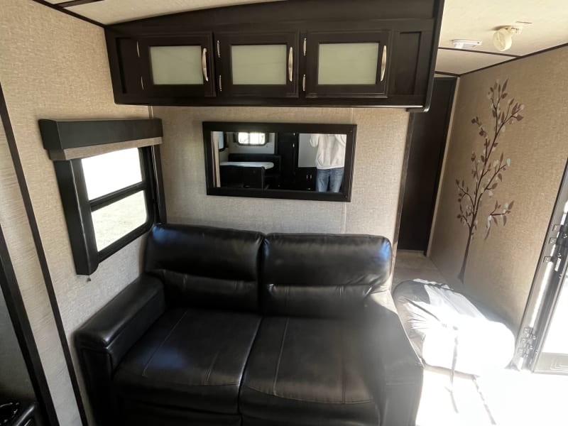 comfy loveseat right inside the door