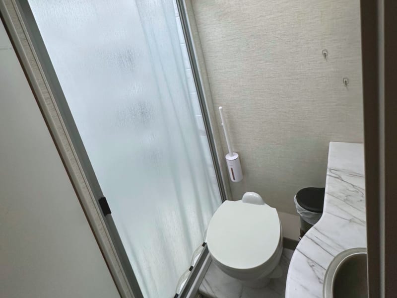 Full size bathroom and shower! Uses tankless water heater. So If connected to city water, endless hot showers! 