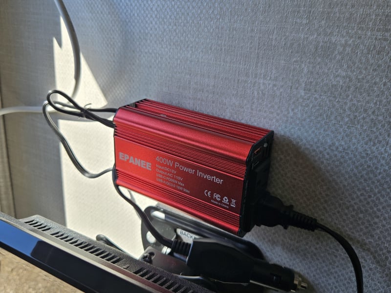 As part of the standard equipment for this R-pod 171C, you will get a 400W power inverter, which is used to power the TV, and has an additional 110v outlet that can be used to charge a laptop.