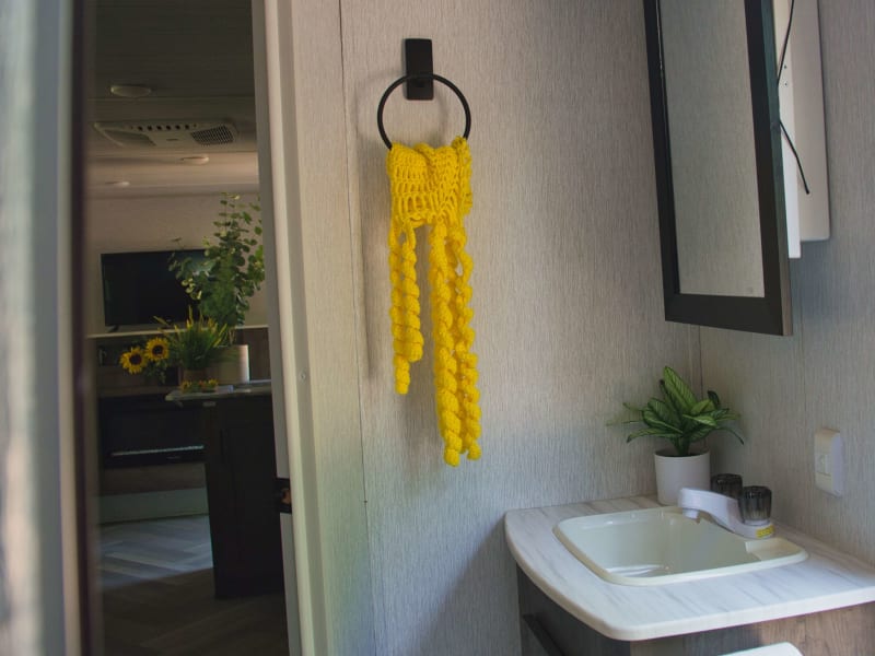 It comes with a standard indoor shower stall — no full bathtub.