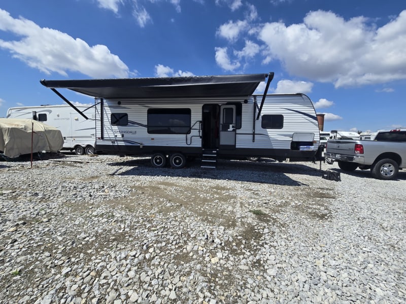 Large awning with space for sitting area underneath!