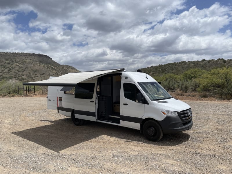 Retractable awnings on both sides with wind sensors provide great shade. 
