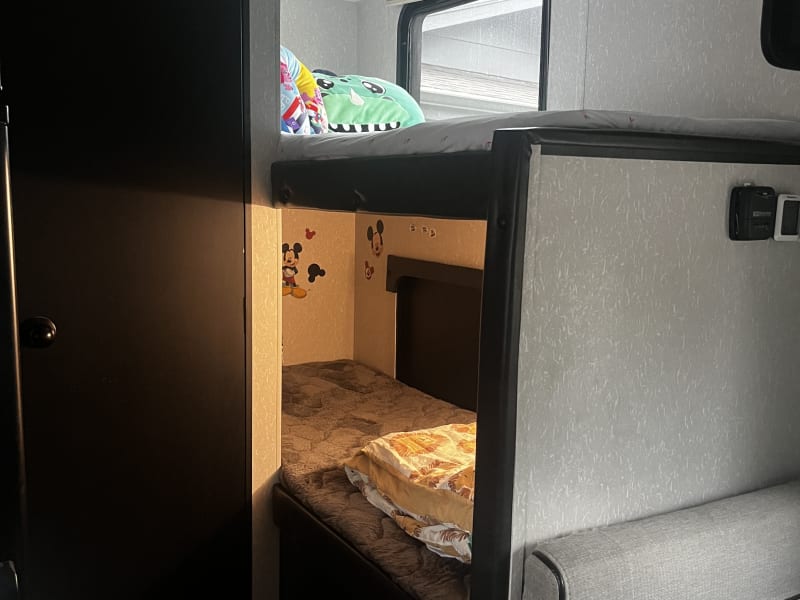 Bunk beds. Both include a light and outlets. 