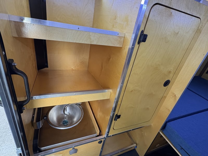 Slide out sink and storage 