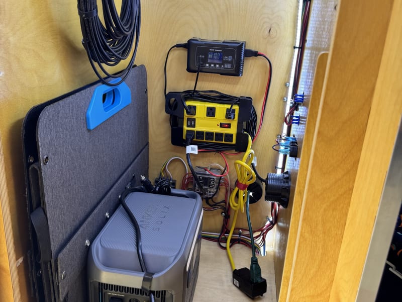 Closet with power systems and solar panels. 