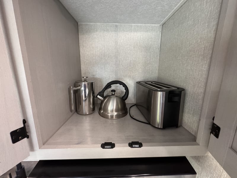 Toaster, tea, pot, and coffee maker