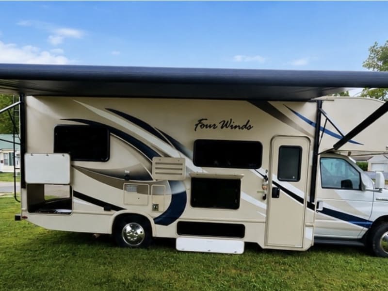 2018 Thor Four Winds storage doors open and canopy out