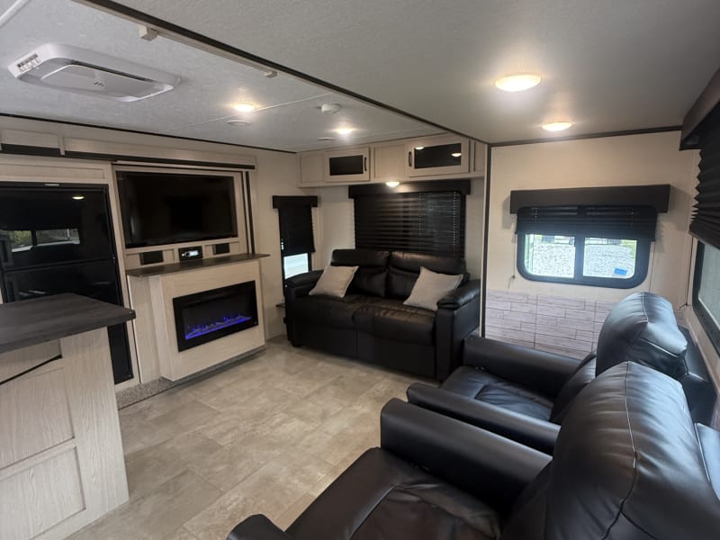 Two comfortable theater chairs plus a couch that easily converts into a pull-out bed for extra sleeping space
