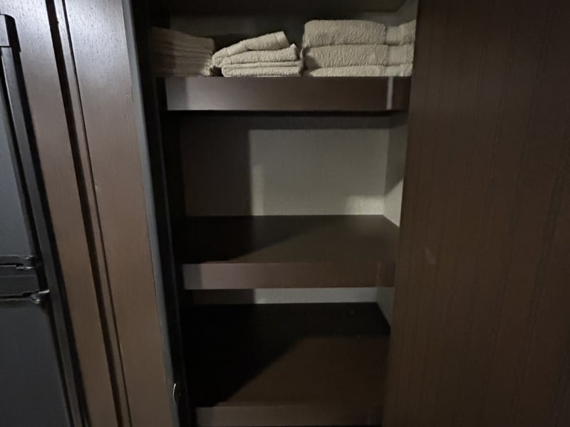 Large pantry next to fridge