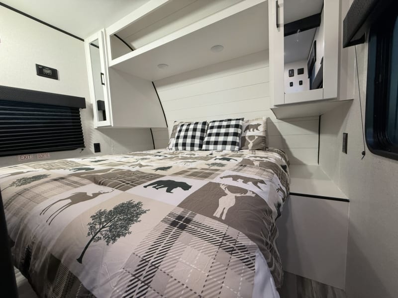 Queen bed with storage underneath. 