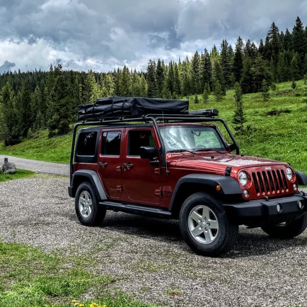 2014 Jeep Wrangler Unlimited Truck Camper available for rent in Bozeman, Montana