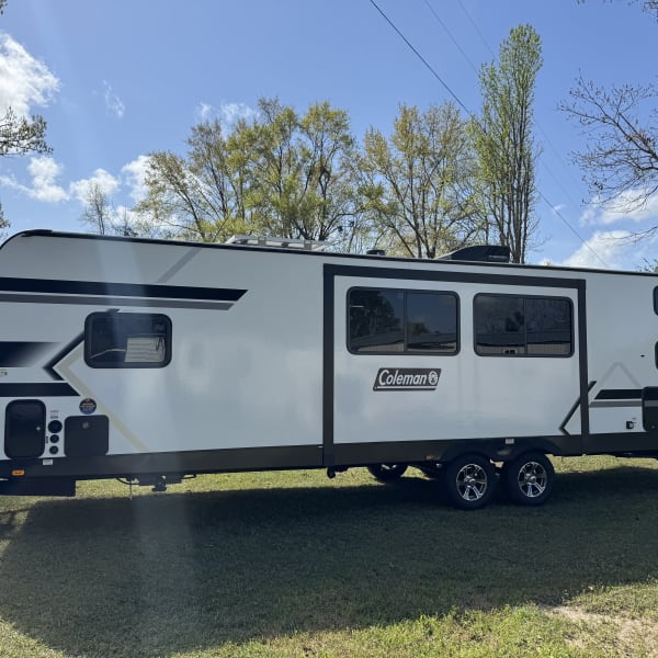 2025 Keystone Coleman Legacy 2900BH Travel Trailer available for rent in Pace, Florida