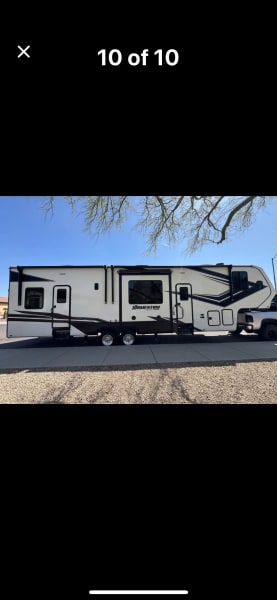 2022 Grand Design Momentum M-Class Toy Hauler Fifth Wheel available for rent in Surprise, Arizona