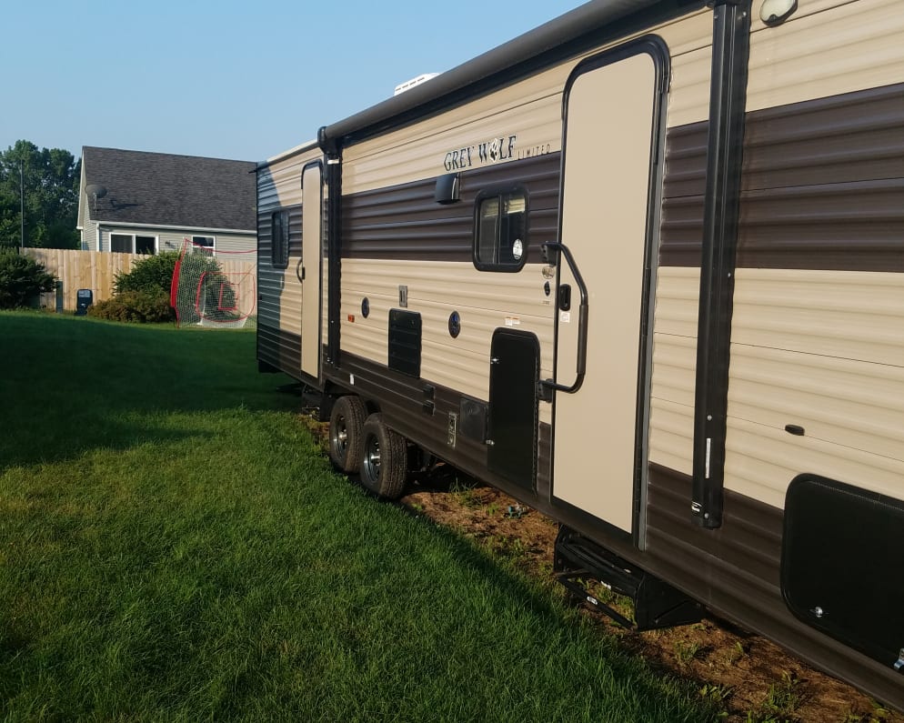 Outdoor 2 doors with awning and outdoor speaker with blue lights 