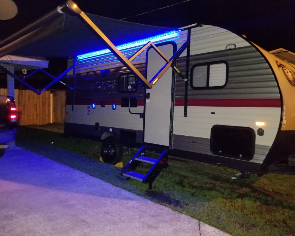 Blue LED lights, waterproof speakers, exterior TV mount and hook up.