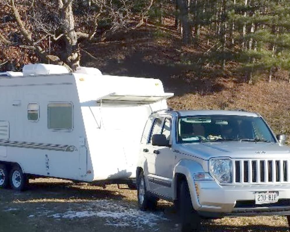 Easy to tow. Weighs about 2800 lbs. dry. 