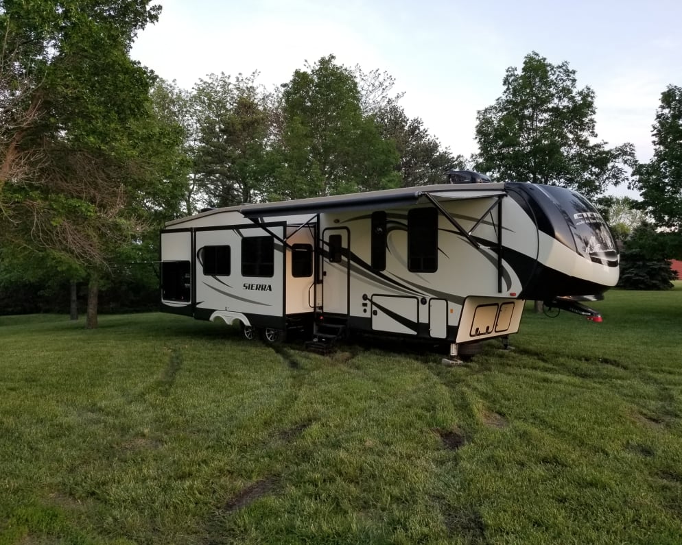 Exterior with 2 slides and awning out.