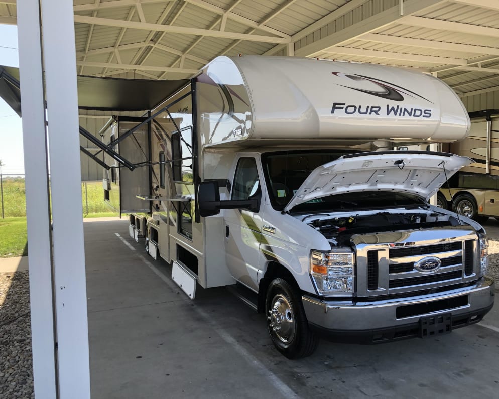 Passengers slide out with awning and lots of storage compartments.